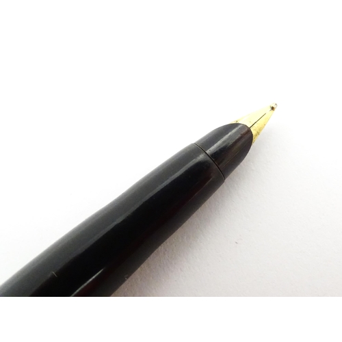 1425 - A boxed Waterman ball point pen, together with a Parker '45' fountain pen, the largest approx 5 1/4