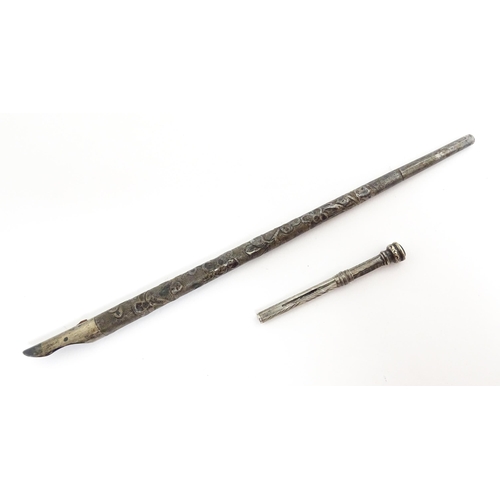 1430 - A Chinese white metal dipping pen with engraved floral decoration. Together with a small silver toot... 