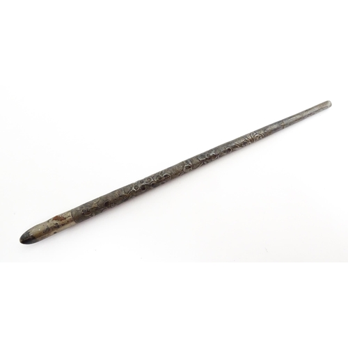 1430 - A Chinese white metal dipping pen with engraved floral decoration. Together with a small silver toot... 