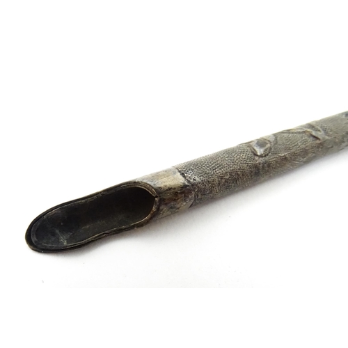 1430 - A Chinese white metal dipping pen with engraved floral decoration. Together with a small silver toot... 