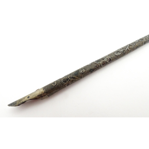 1430 - A Chinese white metal dipping pen with engraved floral decoration. Together with a small silver toot... 