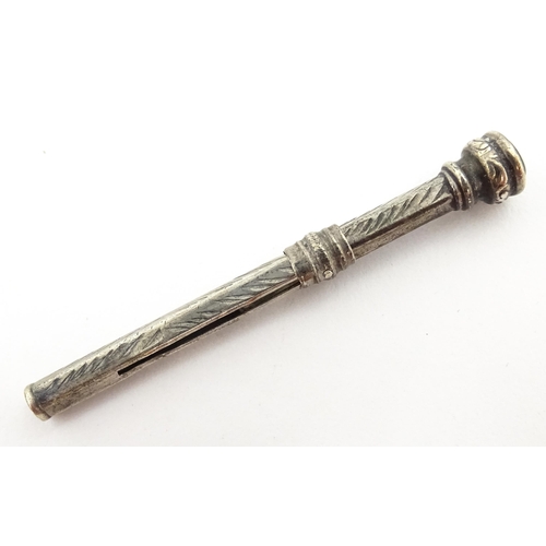 1430 - A Chinese white metal dipping pen with engraved floral decoration. Together with a small silver toot... 