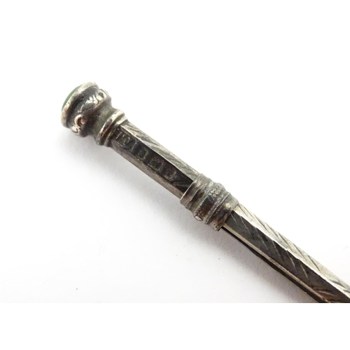 1430 - A Chinese white metal dipping pen with engraved floral decoration. Together with a small silver toot... 