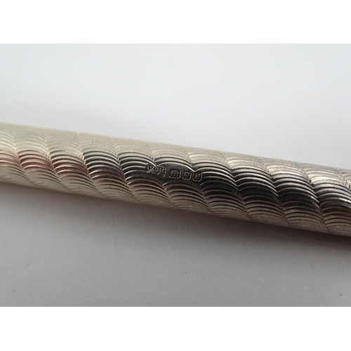 1431 - A silver cased ball point pen, hallmarked London 1976 maker Ramsden & Rowed, together with a Parker ... 