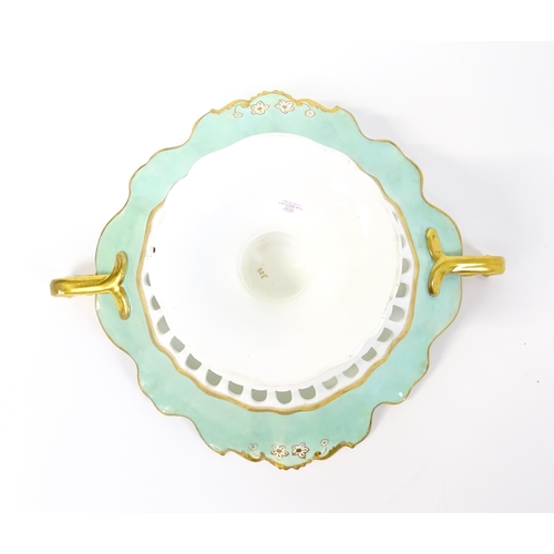 253 - A Davenport part dessert service decorated with a pale blue glaze and gilt floral detail, to include... 