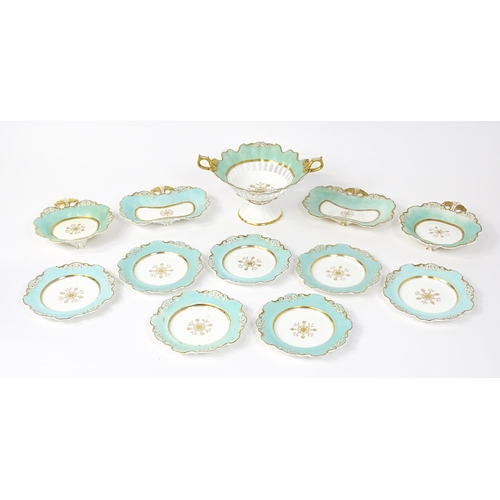 253 - A Davenport part dessert service decorated with a pale blue glaze and gilt floral detail, to include... 