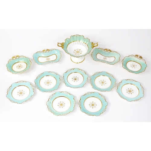 253 - A Davenport part dessert service decorated with a pale blue glaze and gilt floral detail, to include... 