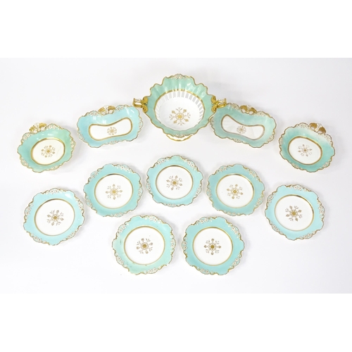 253 - A Davenport part dessert service decorated with a pale blue glaze and gilt floral detail, to include... 