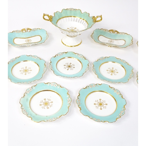 253 - A Davenport part dessert service decorated with a pale blue glaze and gilt floral detail, to include... 