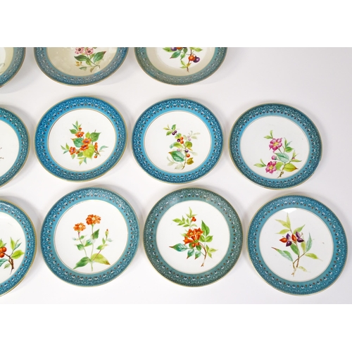 254 - A Royal Worcester part dessert service with hand painted decoration depicting flowers, foliage and b... 