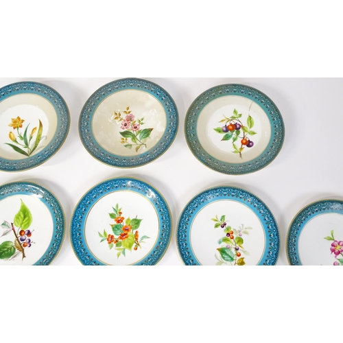 254 - A Royal Worcester part dessert service with hand painted decoration depicting flowers, foliage and b... 