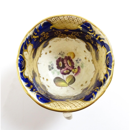 255 - A quantity of English 19thC tea wares with hand painted floral and foliate decoration and gilt highl... 