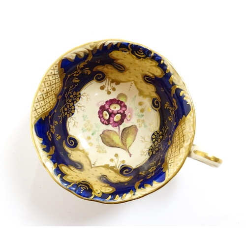 255 - A quantity of English 19thC tea wares with hand painted floral and foliate decoration and gilt highl... 