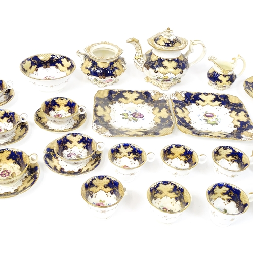 255 - A quantity of English 19thC tea wares with hand painted floral and foliate decoration and gilt highl... 