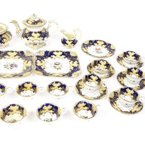 255 - A quantity of English 19thC tea wares with hand painted floral and foliate decoration and gilt highl... 