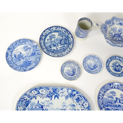 256 - A quantity of assorted 19thC and later blue and white dinner wares to include tankard, meat plates, ... 