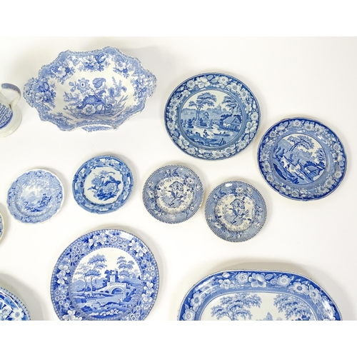 256 - A quantity of assorted 19thC and later blue and white dinner wares to include tankard, meat plates, ... 