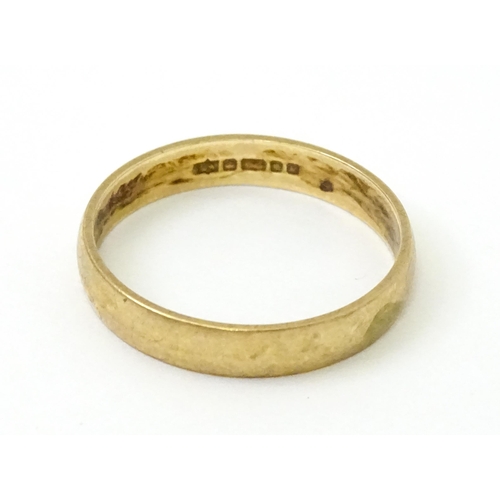 729 - A 9ct gold ring. Ring size approx. T. (approx 2.5g)