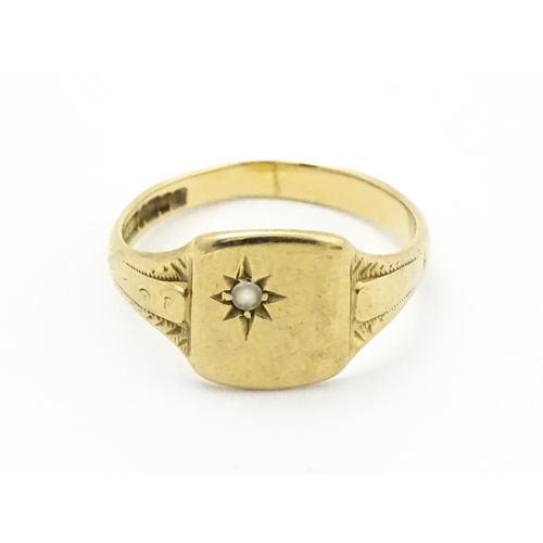 738 - A Gentleman's 9ct gold ring  set with white stone. Ring size approx. X. (TW approx. 4.5g)