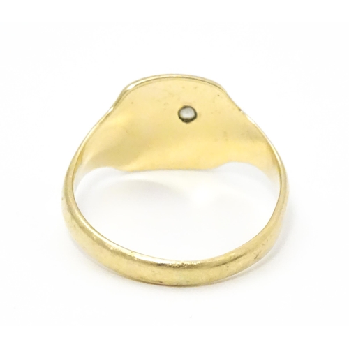 738 - A Gentleman's 9ct gold ring  set with white stone. Ring size approx. X. (TW approx. 4.5g)