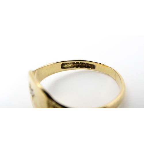 738 - A Gentleman's 9ct gold ring  set with white stone. Ring size approx. X. (TW approx. 4.5g)