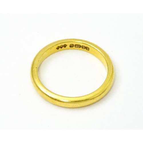 739 - A 22ct gold ring. Ring size approx. I.(Approx 3.5g)