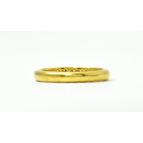 739 - A 22ct gold ring. Ring size approx. I.(Approx 3.5g)