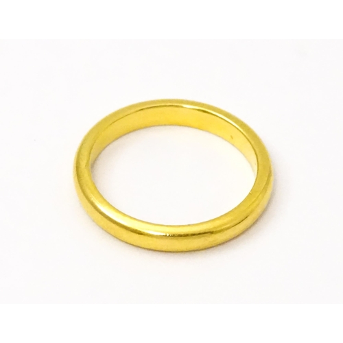 739 - A 22ct gold ring. Ring size approx. I.(Approx 3.5g)