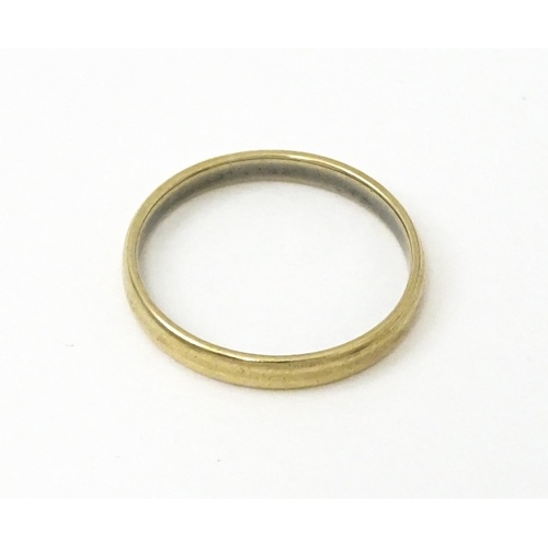 742 - A 9ct ring. Ring size approx. K. (Approx 1g)