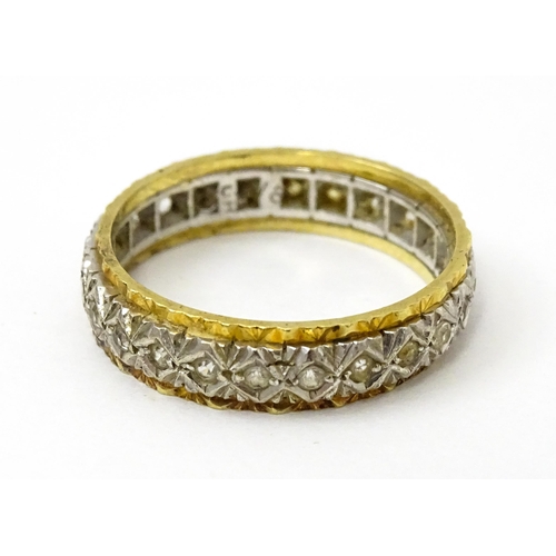 759 - A gold and  white metal ring set with white stones. Ring size approx. O