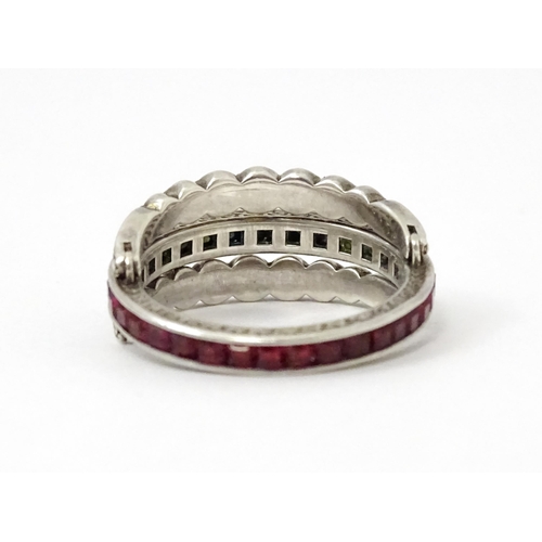 773 - An unusual metamorphic Art Deco eternity ring the central band half set with red stones and half set... 