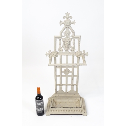 1475 - An Aesthetic Movement cast iron stick stand, decorated with goat's mask, rose and beading, in grey p... 