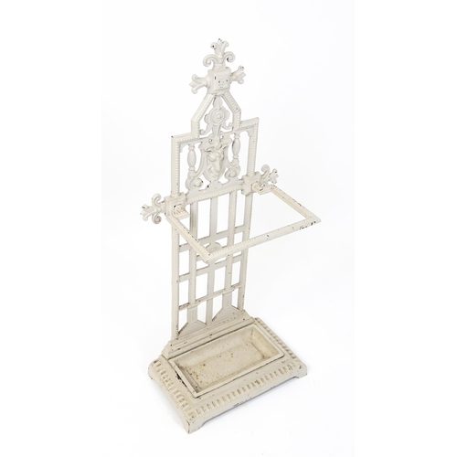 1475 - An Aesthetic Movement cast iron stick stand, decorated with goat's mask, rose and beading, in grey p... 