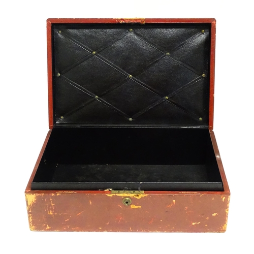 1496 - An early 20thC British government despatch box, the red leather exterior with gold tooled George V c... 