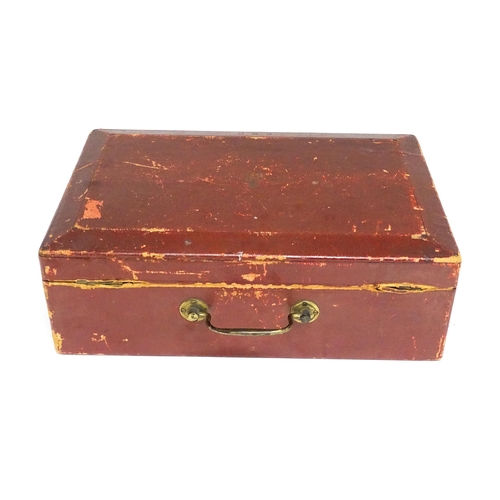 1496 - An early 20thC British government despatch box, the red leather exterior with gold tooled George V c... 