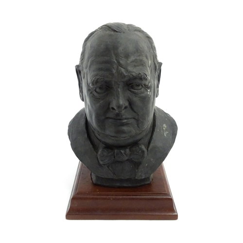 1504 - A basalt bust depicting Sir Winston Churchill by John Bromley, titled under and signed to reverse. R... 