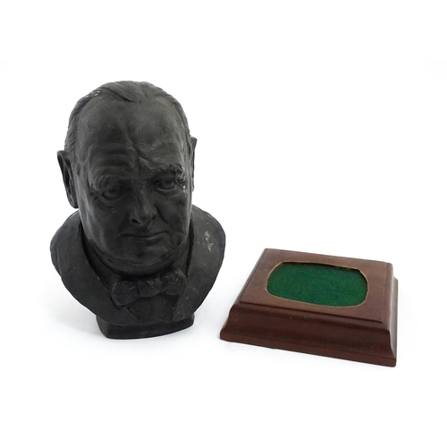 1504 - A basalt bust depicting Sir Winston Churchill by John Bromley, titled under and signed to reverse. R... 