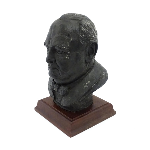 1504 - A basalt bust depicting Sir Winston Churchill by John Bromley, titled under and signed to reverse. R... 