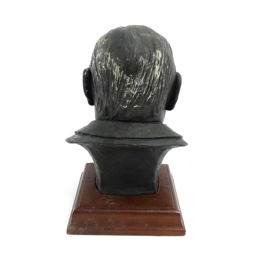 1504 - A basalt bust depicting Sir Winston Churchill by John Bromley, titled under and signed to reverse. R... 