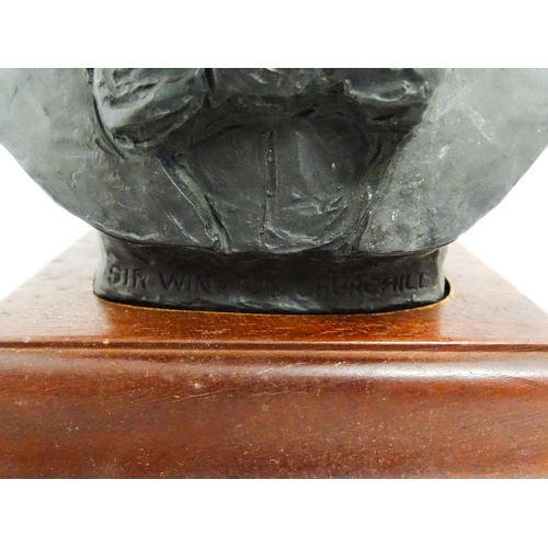 1504 - A basalt bust depicting Sir Winston Churchill by John Bromley, titled under and signed to reverse. R... 