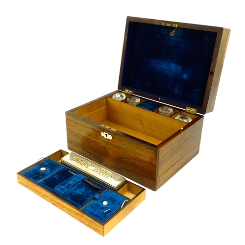 1511 - A Victorian rosewood work box with inlaid mother of pearl escutcheon detail, opening to reveal a fit... 