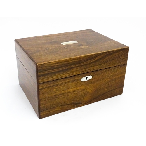 1511 - A Victorian rosewood work box with inlaid mother of pearl escutcheon detail, opening to reveal a fit... 