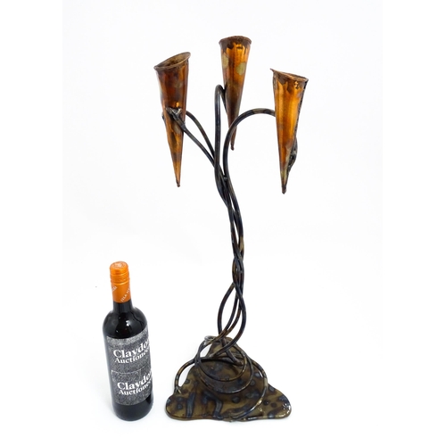 1514 - A 20thC Cornish Art Nouveau style centrepiece / candle holder by Paul Hoskin with three copper branc... 