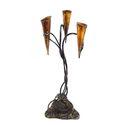 1514 - A 20thC Cornish Art Nouveau style centrepiece / candle holder by Paul Hoskin with three copper branc... 