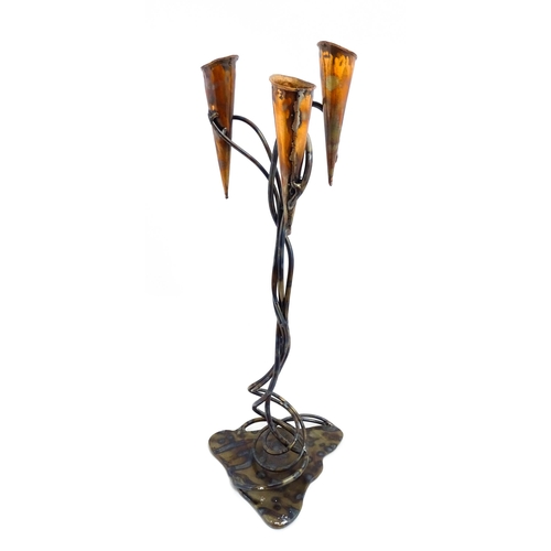 1514 - A 20thC Cornish Art Nouveau style centrepiece / candle holder by Paul Hoskin with three copper branc... 