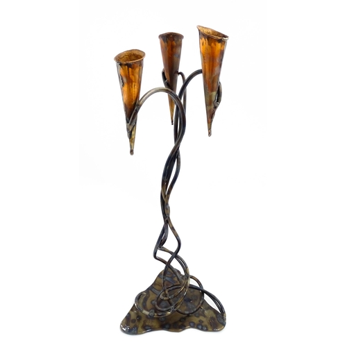 1514 - A 20thC Cornish Art Nouveau style centrepiece / candle holder by Paul Hoskin with three copper branc... 