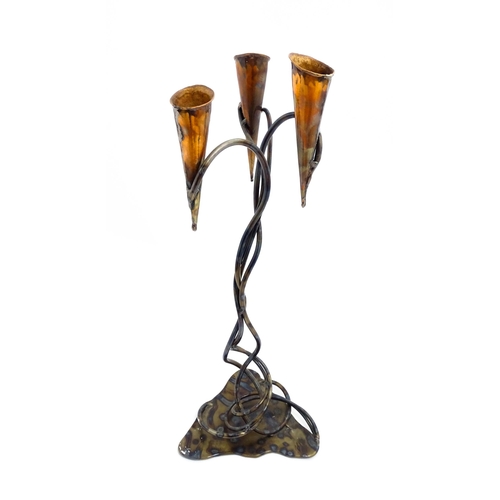 1514 - A 20thC Cornish Art Nouveau style centrepiece / candle holder by Paul Hoskin with three copper branc... 