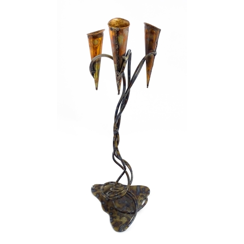 1514 - A 20thC Cornish Art Nouveau style centrepiece / candle holder by Paul Hoskin with three copper branc... 