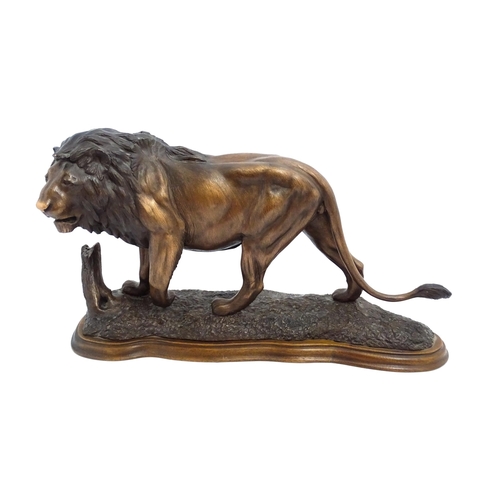 1515 - A 20thC limited edition Tim Nicklin sculpture depicting a prowling lion. Signed, numbered 18 / 20 an... 