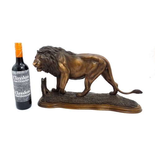 1515 - A 20thC limited edition Tim Nicklin sculpture depicting a prowling lion. Signed, numbered 18 / 20 an... 